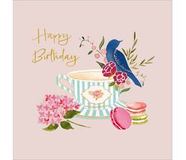 Bird Sitting On A Teacup And Saucer