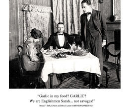 Two Men And A Woman Sitting Around Dinner Table