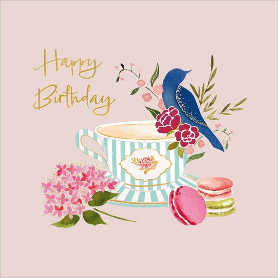 Bird Sitting On A Teacup And Saucer