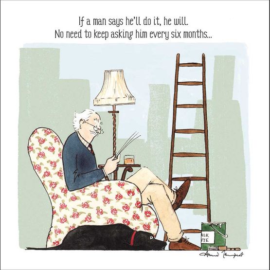 Man Sitting In An Armchair Reading